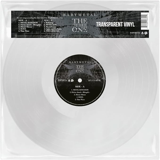 Transparent vinyl record with a label that includes the tracklist and the text 'BABYMETAL THE OTHER ONE'.
