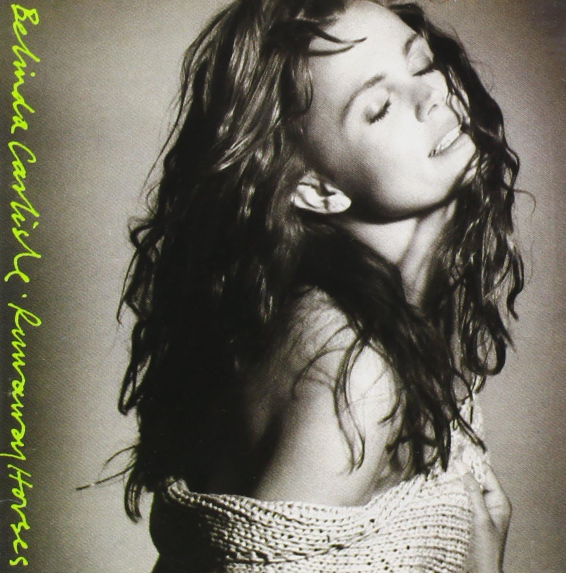 Black and white album cover with a person and text on a plain background
