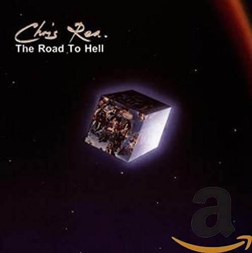 The image features the cover art for the audio CD titled "The Road To Hell" by Chris Rea. The artwork depicts a dark, distorted image of a cube with a starry background, emphasizing the album's dark and intense theme.