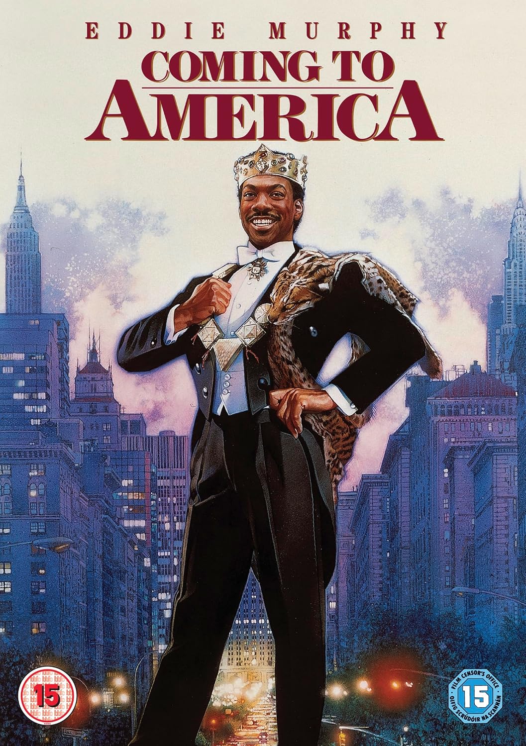 Movie poster for 'Coming to America' featuring Eddie Murphy in a tuxedo and crown standing in front of a city skyline, with the title at the top and age rating badges at the bottom.