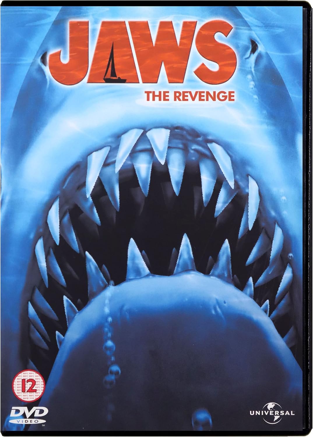 Jaws: The Revenge DVD cover featuring a close-up of a shark's open mouth with sharp teeth, the title 'JAWS THE REVENGE' in orange and white, a DVD logo, and the Universal logo.