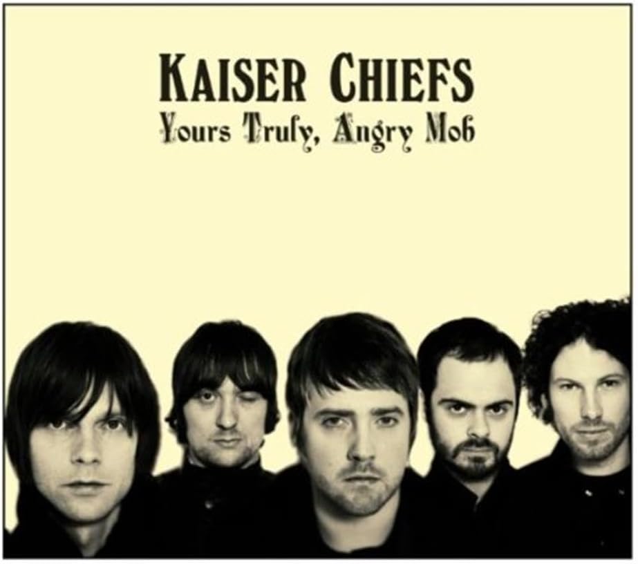 Album cover for 'Yours Truly, Angry Mob' by Kaiser Chiefs featuring a black and white photo of the band members.