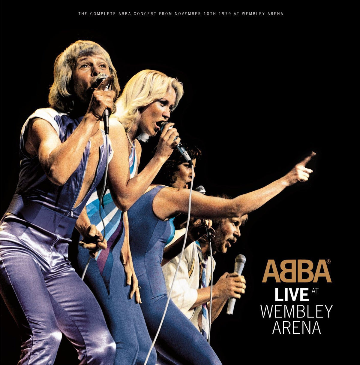 ABBA performing on stage with 'Live at Wembley Arena' text