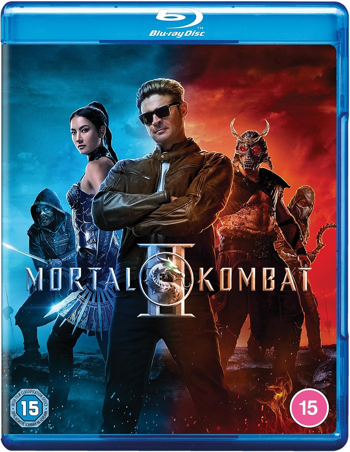 Mortal Kombat II Blu-ray Disc cover featuring characters Warhead, Drago, and Saka against a split blue and red background, with the Blu-ray Disc logo at the top and 15 age rating icons in the corners.