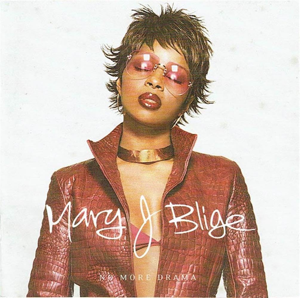 Album cover featuring a person wearing sunglasses and a textured jacket with 'Mary J. Blige' and 'No More Drama' text.