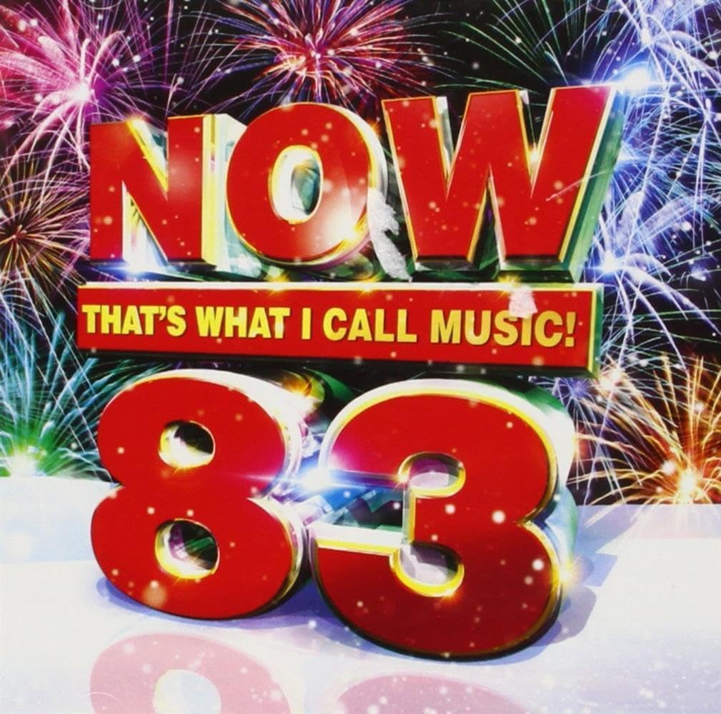 Album cover for 'NOW That's What I Call Music! 83' with colorful fireworks in the background