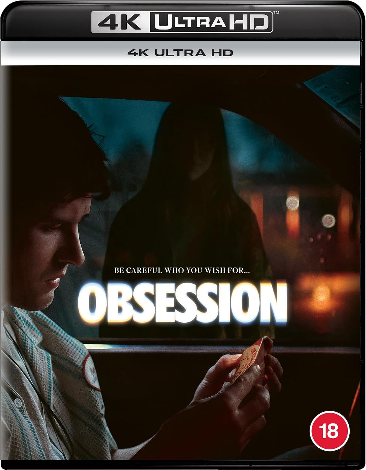 4K Ultra HD movie cover for the film 'Obsession', featuring a dark, moody scene of a man looking out of a car at night with a figure in the window behind him. The title 'OBSESSION' is displayed in large white letters, with a red 18 age rating logo in the bottom right corner.