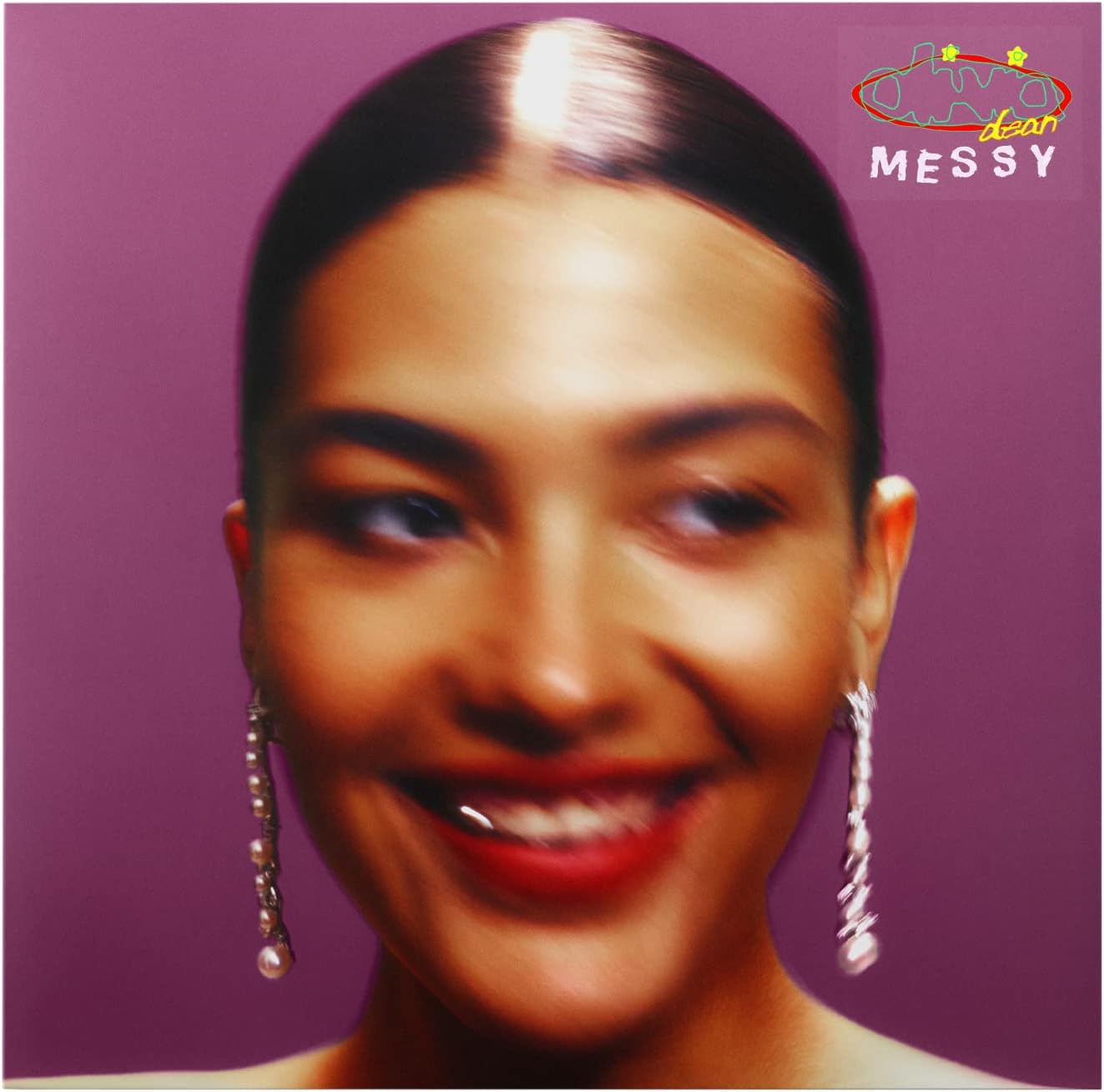 Close-up of a person with styled hair against a purple background with 'MESSY' text.