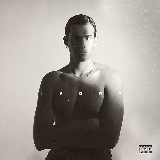 Album cover with a shirtless person and 'IVORY' text on a plain background