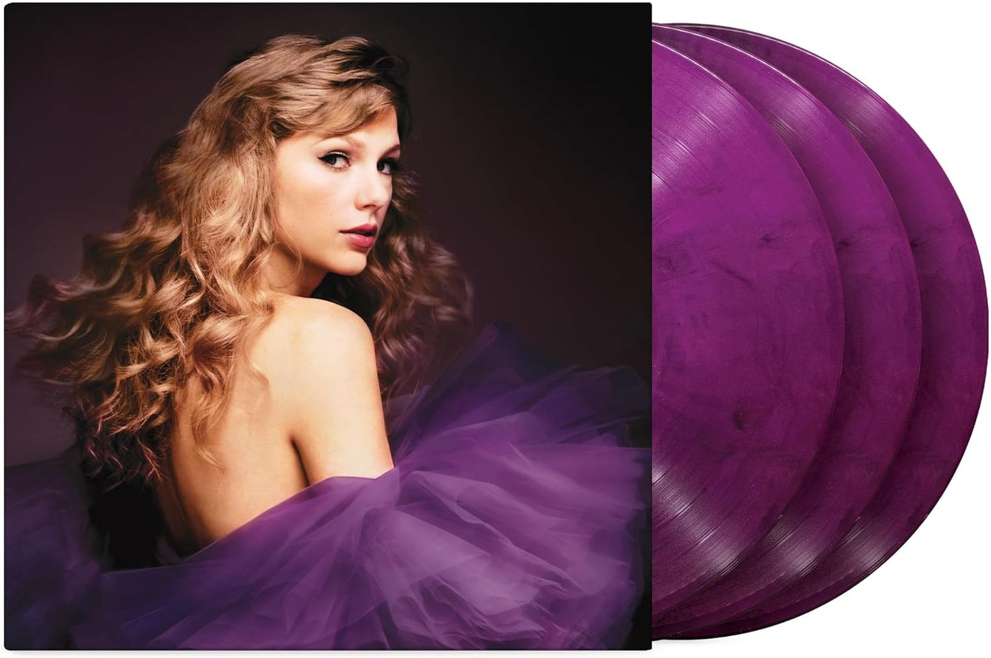 Vinyl record set with a woman in a purple dress on a dark background