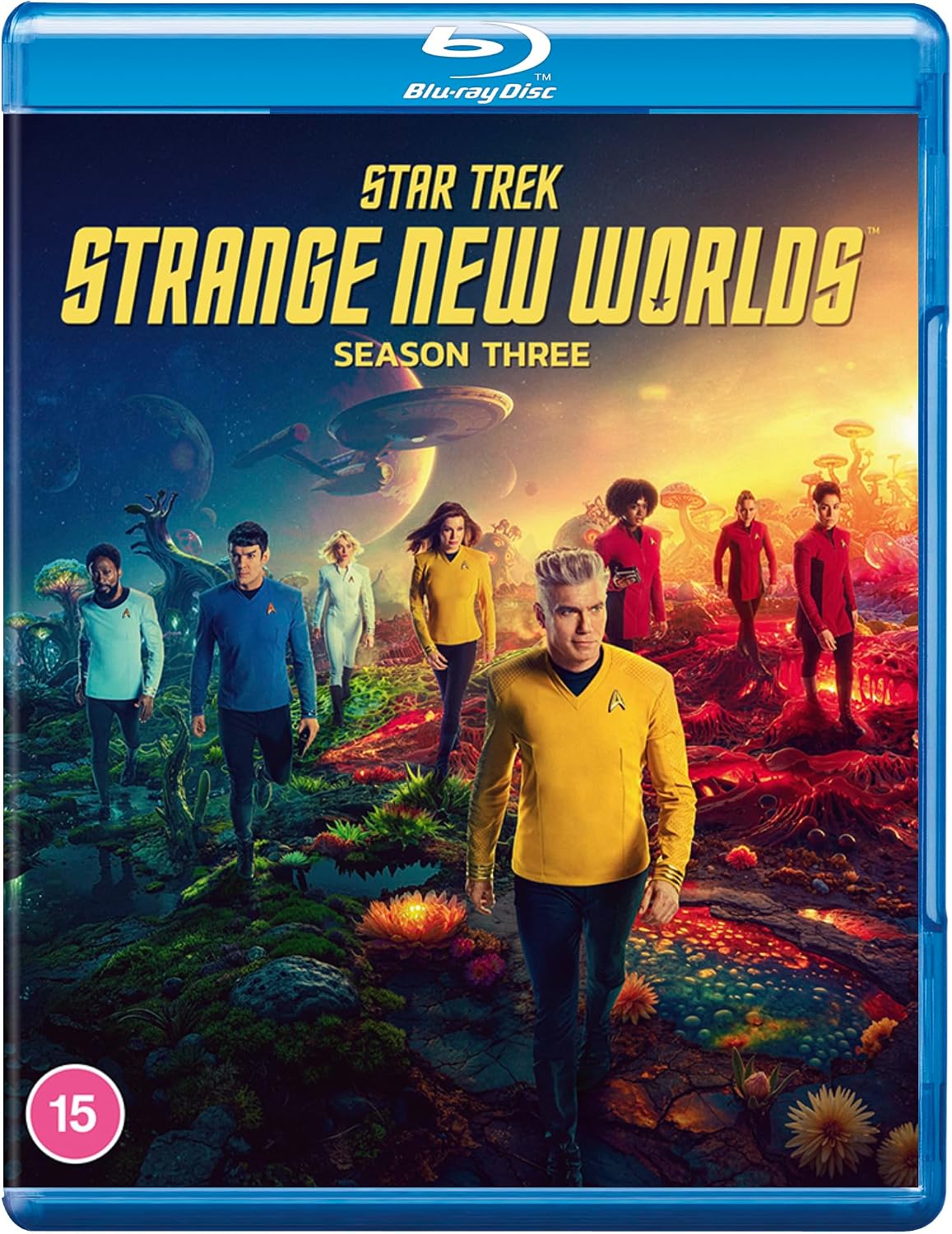 Blu-ray cover of 'Star Trek: Strange New Worlds' Season Three with characters in colorful uniforms on a planet.