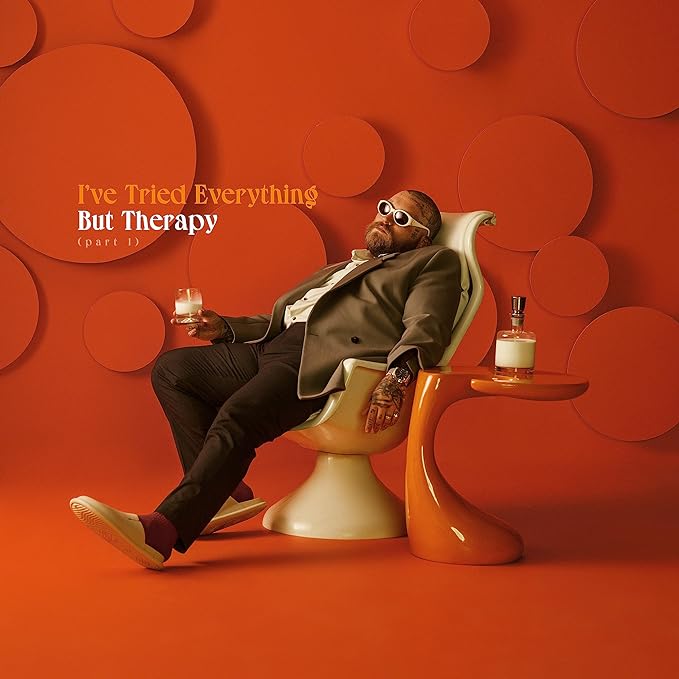 An audio CD cover featuring the artist Teddy Swims seated in a chair against an orange and red abstract background, with the title 'I've Tried Everything But Therapy' prominently displayed.