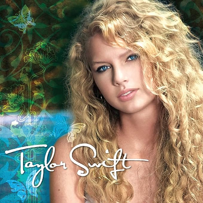 Cover of the audio CD featuring the artist Taylor Swift with a colorful floral background.
