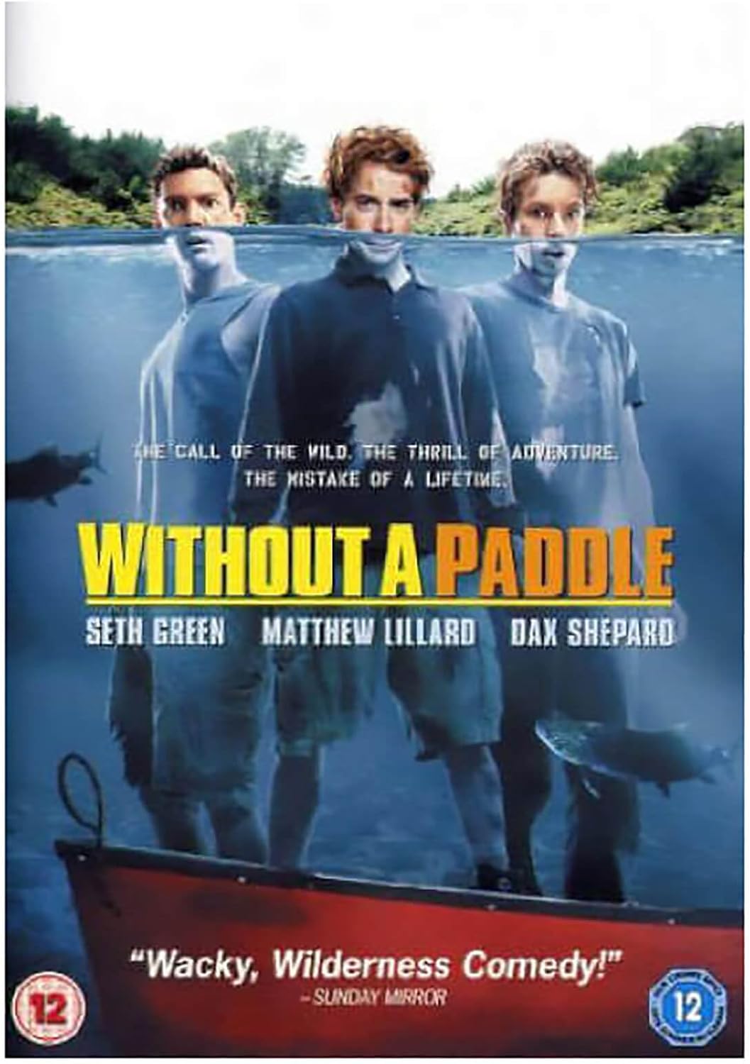 Movie poster for the film 'Without a Paddle' featuring three men standing in shallow water with fish around them. Large yellow title text reads 'WITHOUT A PADDLE' across the center, with actor names Seth Green, Matthew Lillard, and Dax Shepard below.