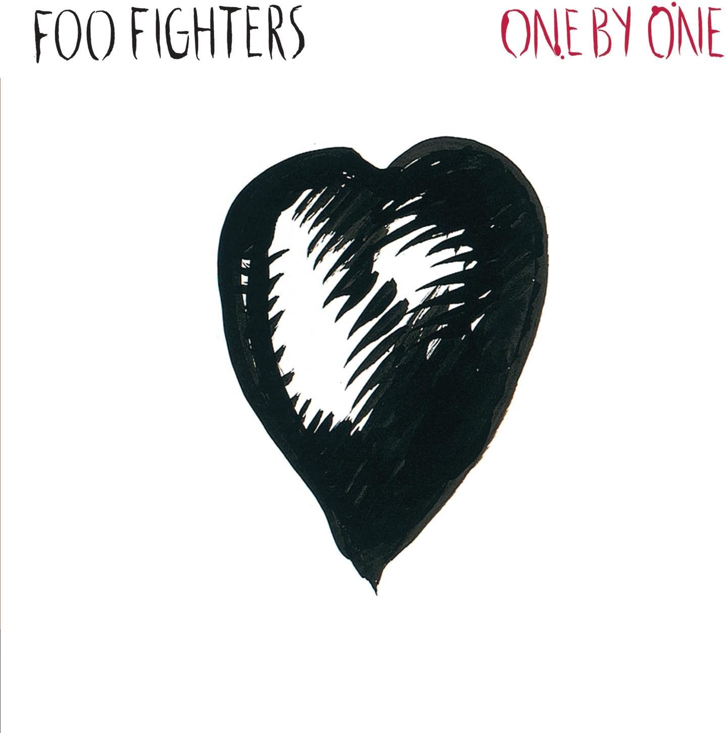 Album cover for 'One by One' by Foo Fighters featuring a black heart with white center.