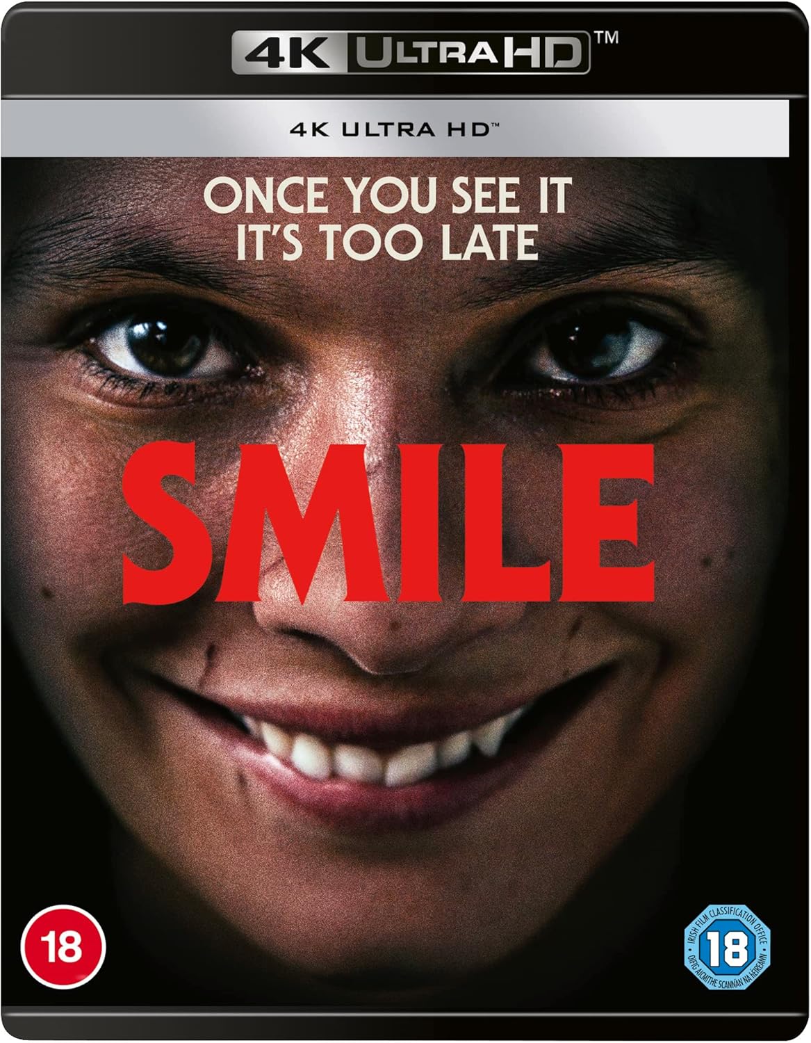 A DVD cover for the movie 'Smile' featuring a close-up image of an actress with a smile on her face, surrounded by a black background with the text '4K ULTRA HD' and a British film rating symbol.