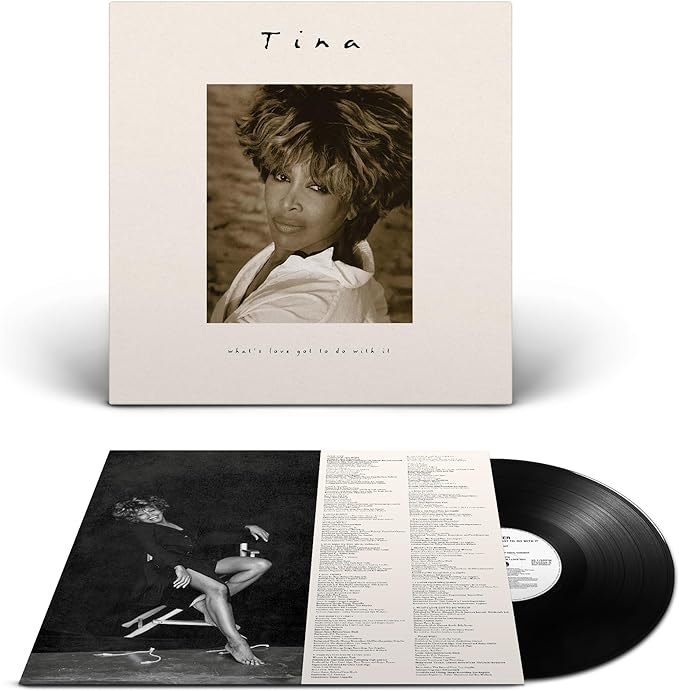 A 30th Anniversary Edition vinyl of Tina Turner's 'What's Love Got To Do With It', featuring a picture of Tina Turner on the cover and tracklisting on the inner sleeve.