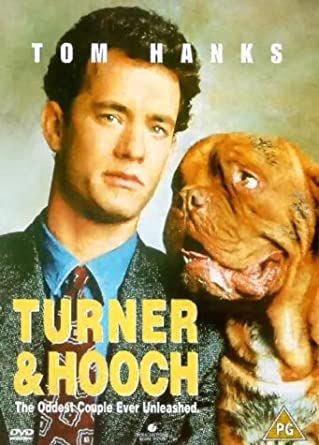 DVD cover for the movie 'Turner & Hooch' featuring a man and a dog prominently.