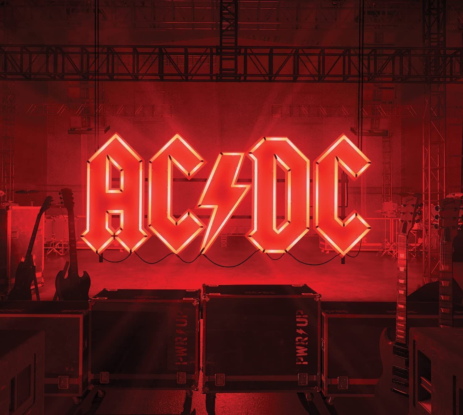 A CD case with the AC/DC logo in red and yellow on the cover, representing the album 'Power Up'.