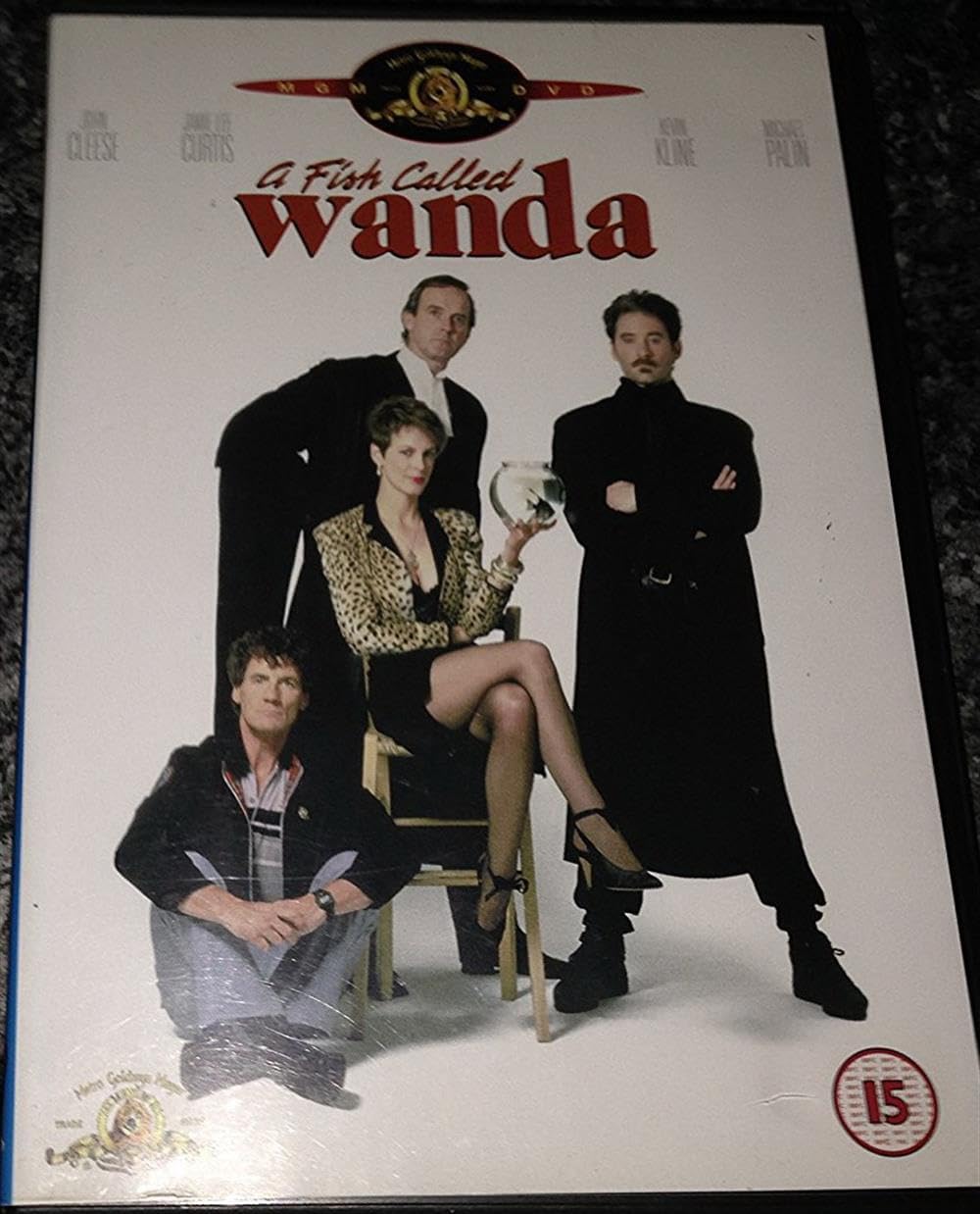 DVD cover of 'A Fish Called Wanda' with four characters on a white background