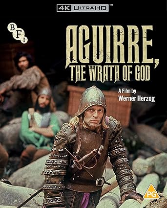 Movie poster for 'Aguirre, The Wrath of God' featuring a character in medieval attire.