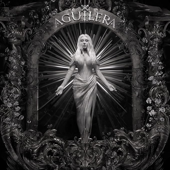 Christina Aguilera CD cover featuring a close-up portrait of the artist with a decorative background.