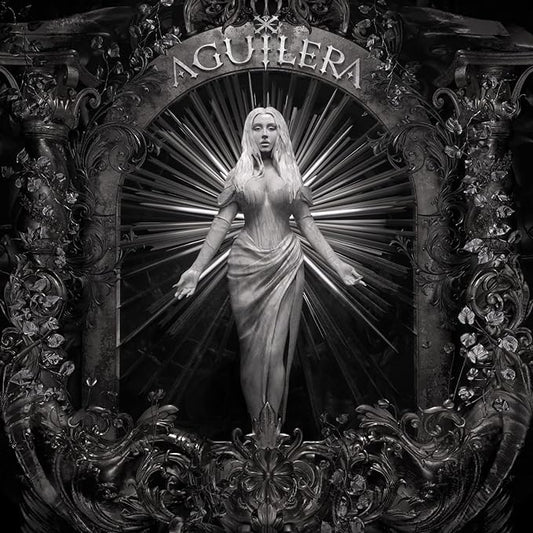 Christina Aguilera CD cover featuring a close-up portrait of the artist with a decorative background.