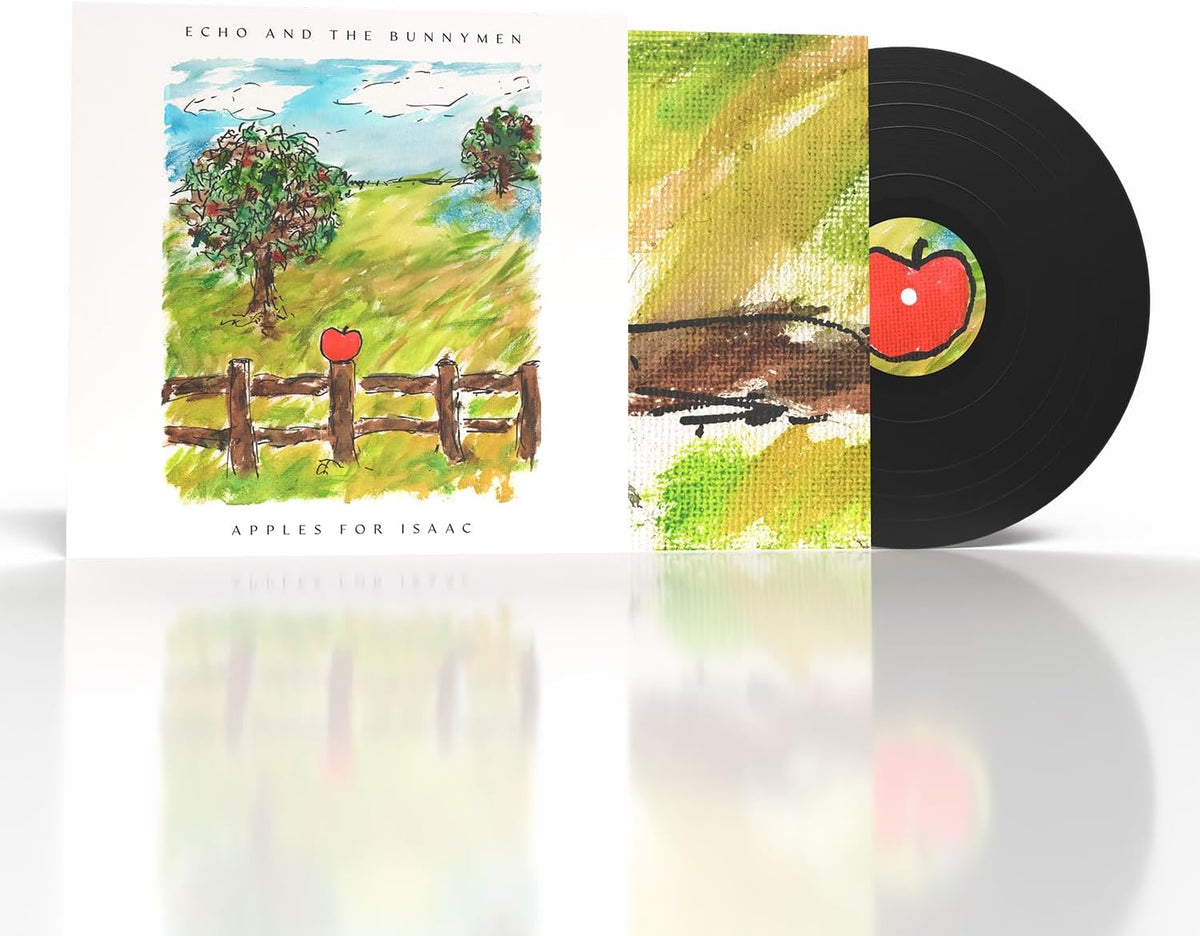 Vinyl record album shown with the illustrated front cover standing beside the partially pulled black record, which has a matching colorful label. The artwork depicts a pastoral landscape with trees, a fence, and a red apple.