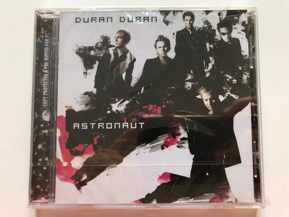 CD cover of 'Astronaut' by Duran Duran with band members and abstract design.