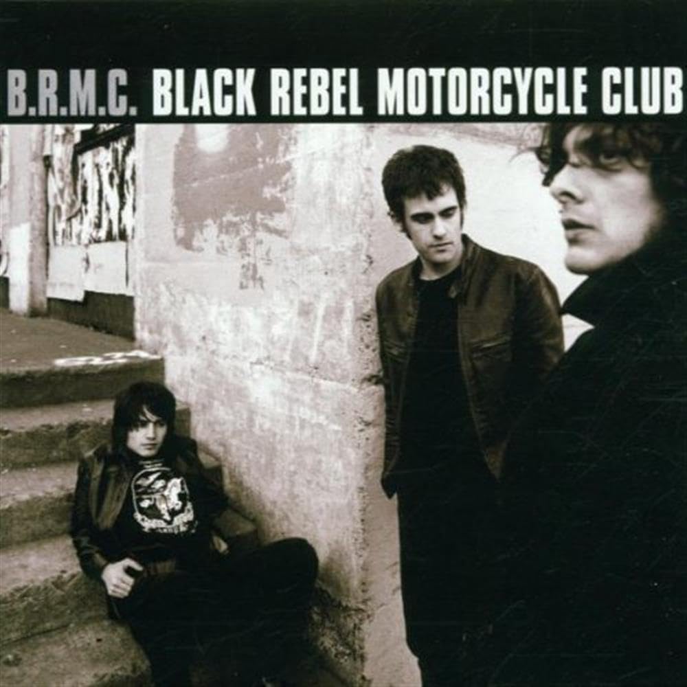 Album cover for Black Rebel Motorcycle Club featuring two individuals against a wall.