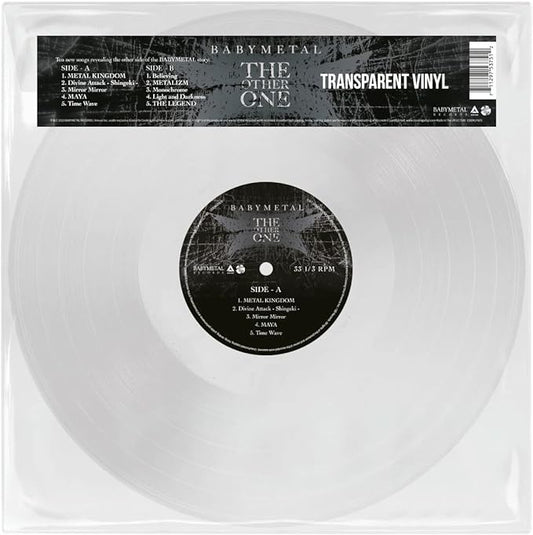 Transparent vinyl record with a label that includes the tracklist and the text 'BABYMETAL THE OTHER ONE'.