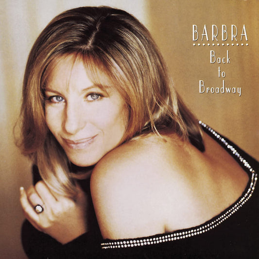 The cover image features a woman with light brown hair and a smile on her face, dressed in a black top. She has her left arm curled around the lower part of her body, and she is wearing a ring on the finger visible in the image.