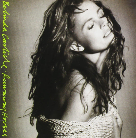 Black and white album cover with a person and text on a plain background