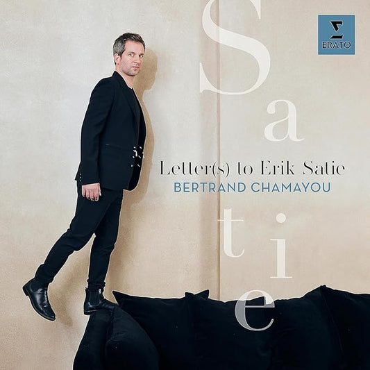 Album cover with a man in a black suit standing against a beige background, featuring the text 'Letter(s) to Erik Satie' by Bertrand Chamayou.