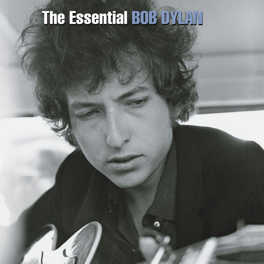 The cover image shows the artist, Bob Dylan, with a black and white photo featuring his face and a guitar.
