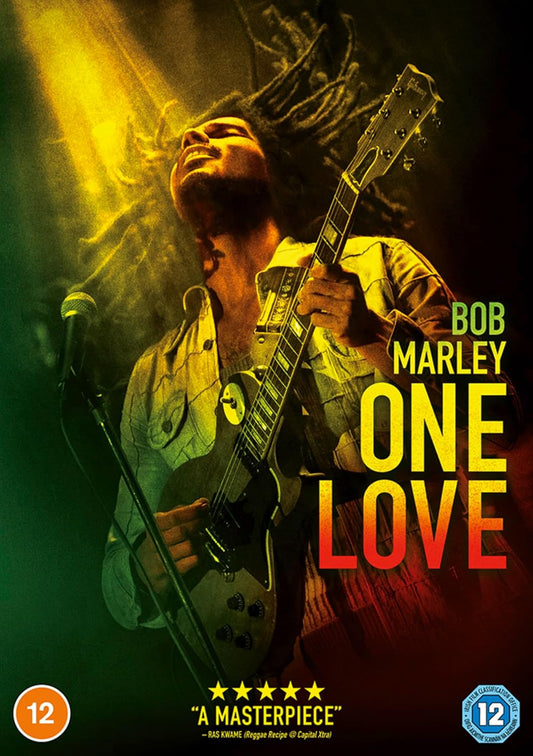 Bob Marley playing guitar with 'One Love' text on a dark background