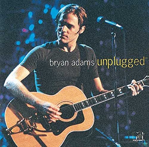The image shows the cover of the 'Bryan Adams MTV Unplugged' album. It features a close-up photograph of a man with a guitar, against a dark background with stage lights in the background.