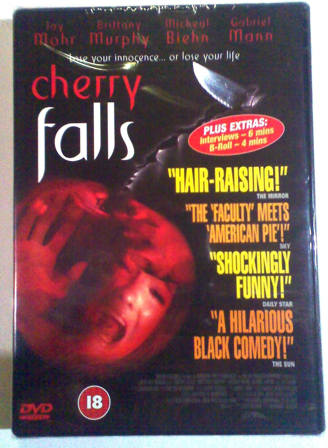DVD cover for the film 'Cherry Falls' featuring a dark, horror-comedy design with a red cherry, a knife, and cast names at the top.