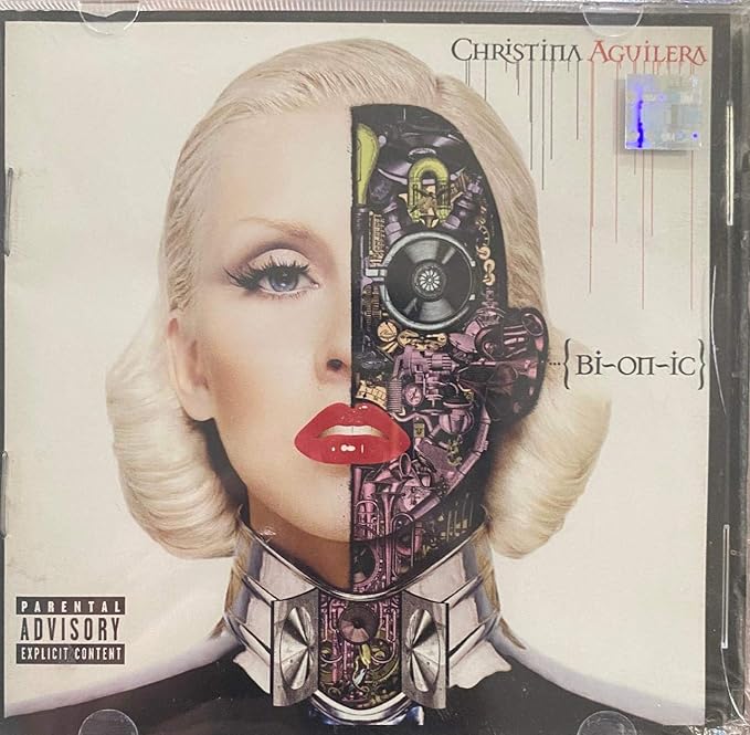 Christina Aguilera's 'Bionic' album cover featuring a split image of the singer with a mechanical device and neon lights motif.