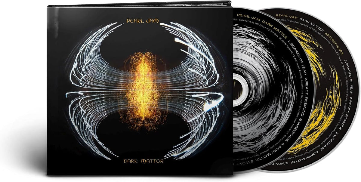 Pearl Jam's 'Dark Matter' album shown with its black sleeve featuring a glowing orange and yellow central burst, alongside two silver and black CDs with yellow graphic accents.