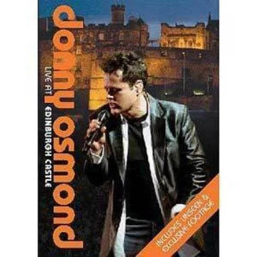 DVD cover for 'Donny Osmond Live F1 Edinburgh Castle', featuring a photo of Donny Osmond holding a microphone in front of Edinburgh Castle at night, with large orange and white text on a black background.