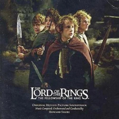 The Lord of the Rings: The Fellowship of the Ring original motion picture soundtrack cover art, featuring the main characters in a dark forest scene with the title and credits at the bottom.