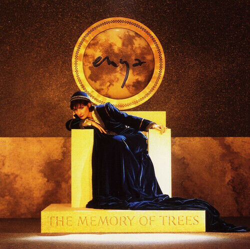 A CD cover featuring the artist Enya with a background suggesting a forest or nature setting, titled 'The Memory of Trees'.