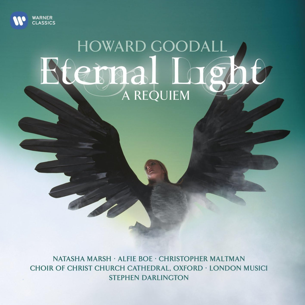 Album cover for Howard Goodall's 'Eternal Light: A Requiem' on Warner Classics, featuring a raven with outstretched black wings against a teal-to-white gradient background, with conductor Stephen Darlington and choir members pictured in the artwork.