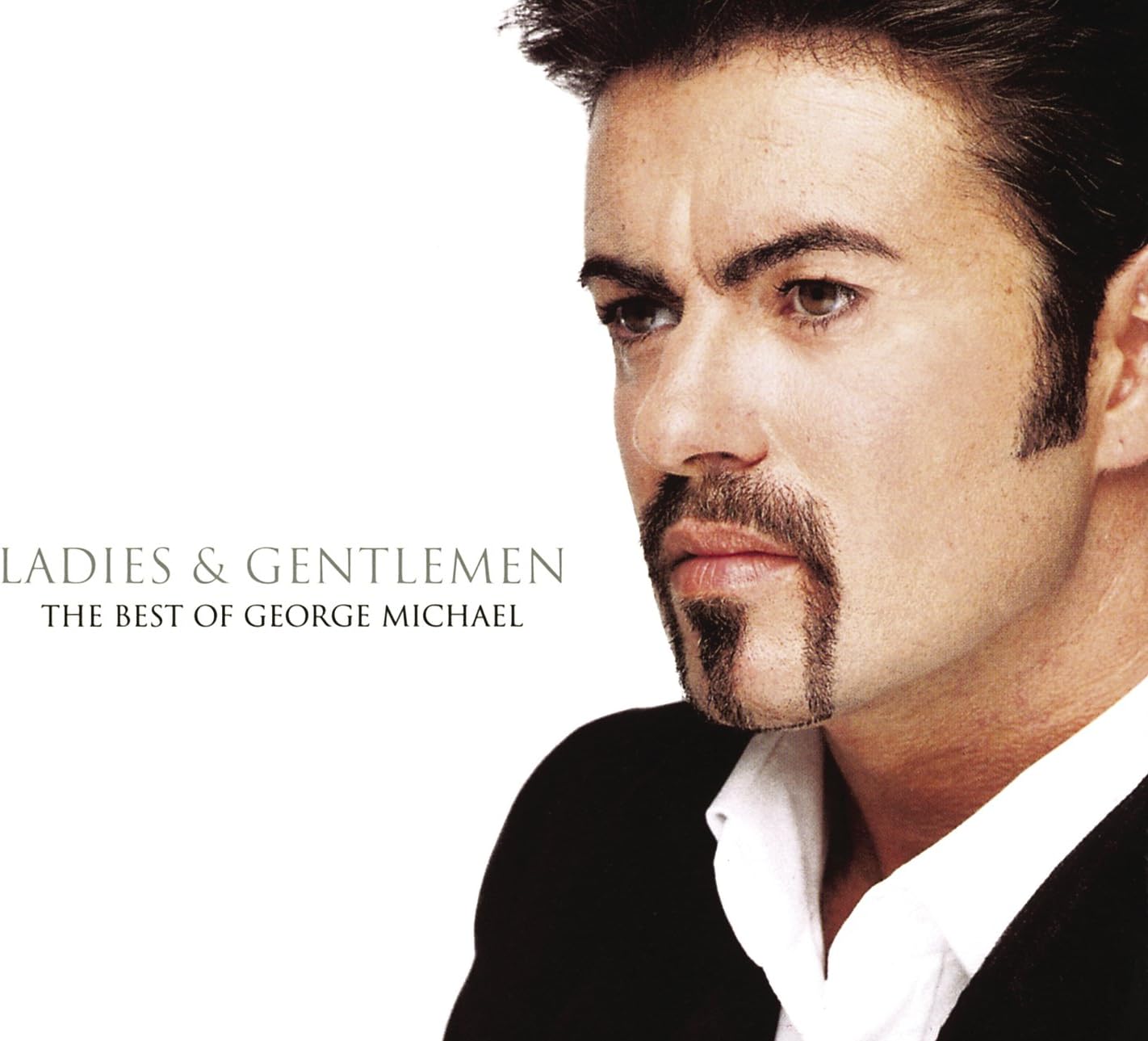 Album cover for 'Ladies & Gentlemen: The Best of George Michael' with a close-up of a man.