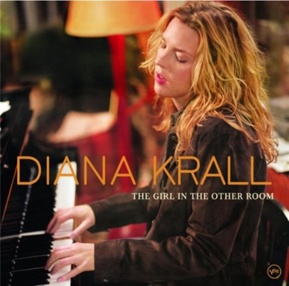Album cover featuring a woman playing piano with text 'Diana Krall The Girl in the Other Room'.