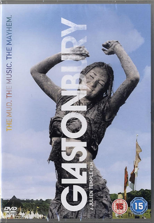 DVD cover of 'Glastonbury' featuring a person with mud on their face against a blue sky.