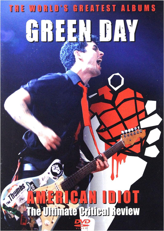 DVD cover of 'Green Day - American Idiot' featuring a man with a tie and a guitar, with the band's logo and the text 'The World's Greatest Albums'.