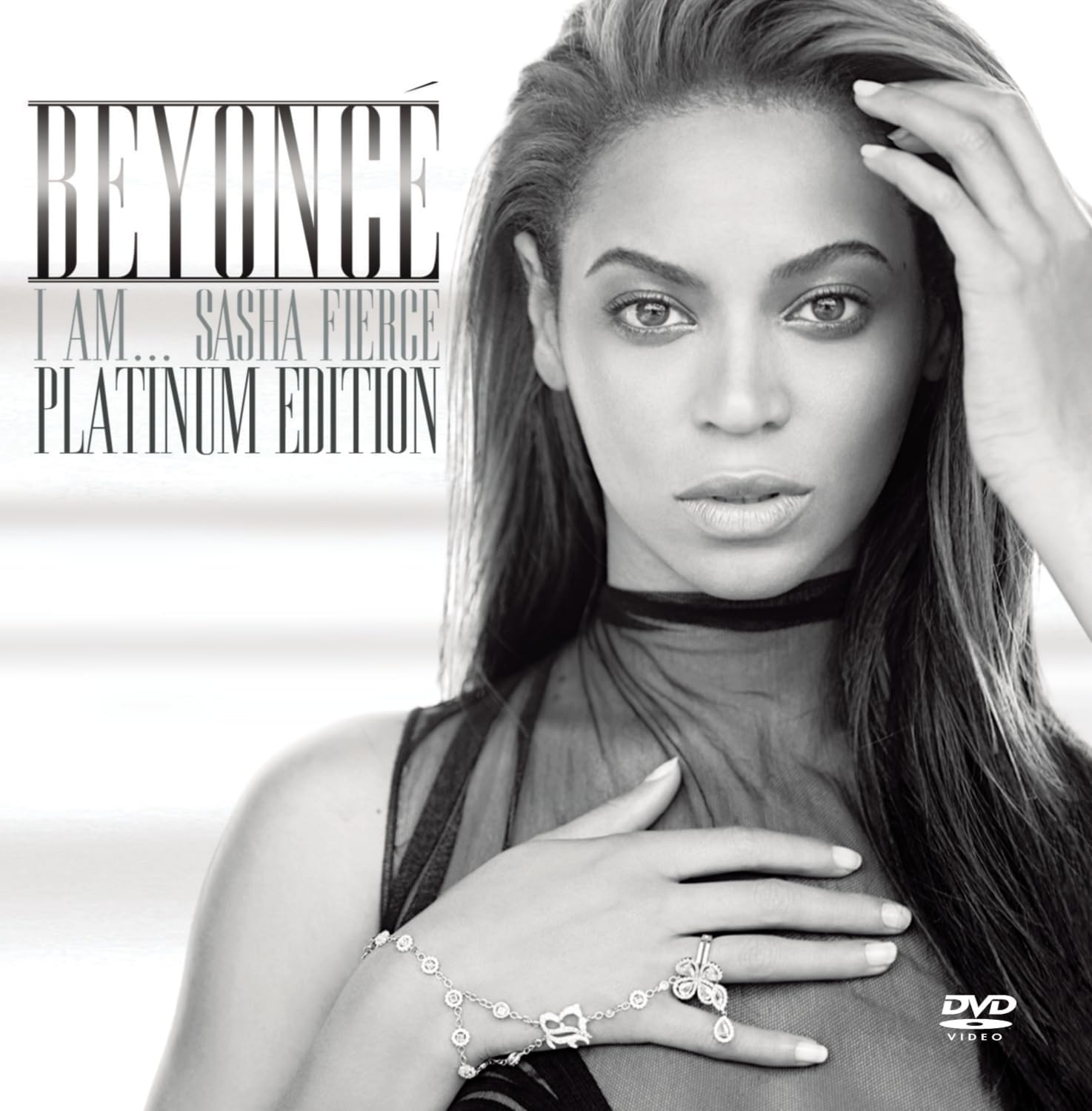 Black and white album cover featuring a woman with jewelry, text 'Beyoncé I am.