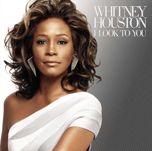 Album cover featuring a woman with text 'Whitney Houston I Look To You' on a gray background